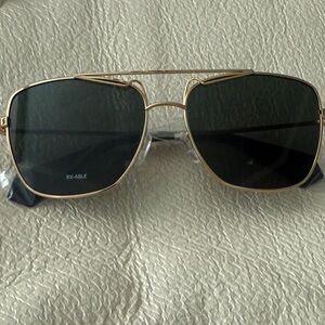 Polaroid Gold Frame Sunglasses with Dark Lenses